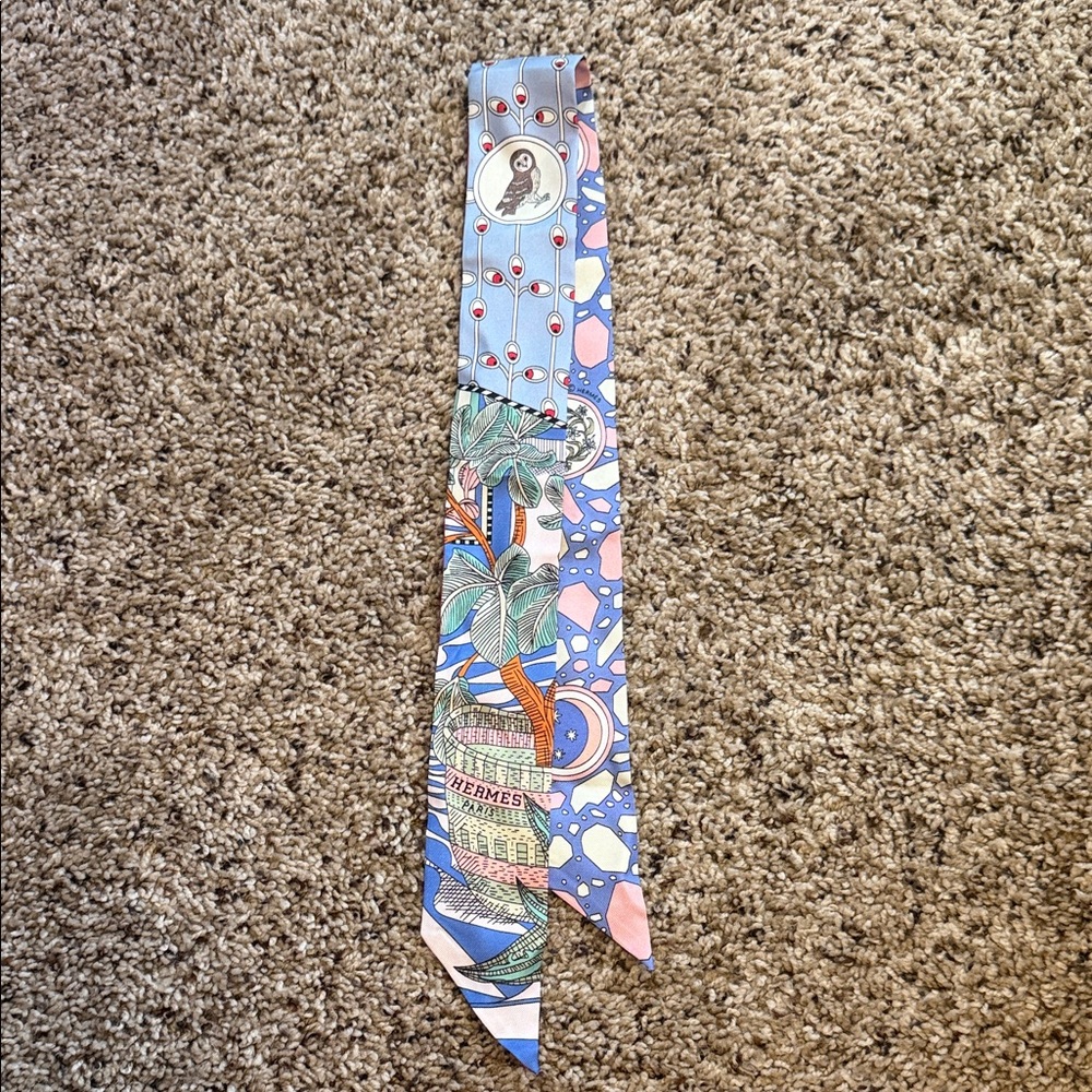 Hermès "La Danse des Amazones" 100% silk twilly scarf in new condition, no box.